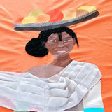 Detail du visage de la femme portant des fruits sur la nappe "Bemiray" orange. Fait de plusieurs matières. Telle un tableau. 